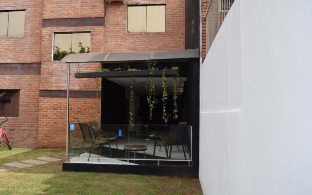 Acosta Ñu Apart Hotel