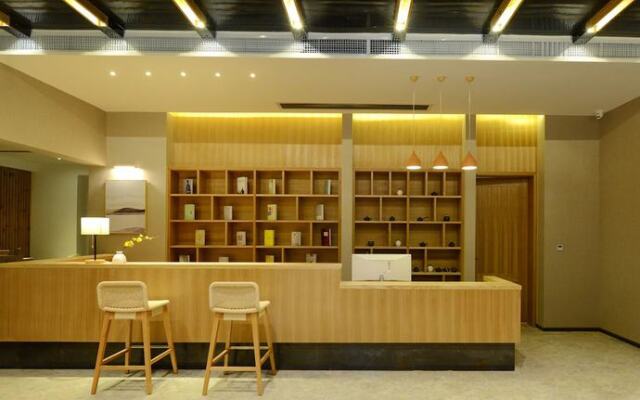Puzhehei Xiyard Resort Hotel