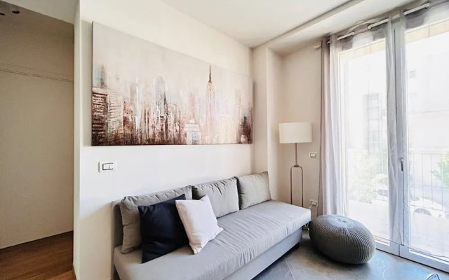 Moderno Bilocale con Terrazzo e Parcheggio