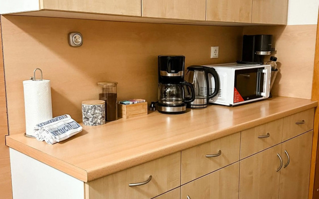 Suiteable Living - Boardinghaus mit Parkplätzen, WLAN und Waschraum