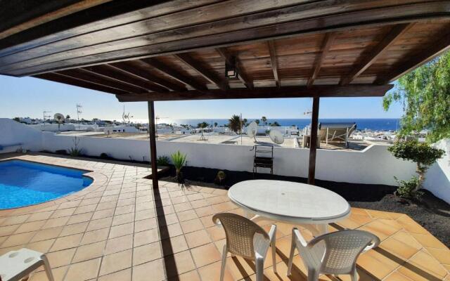 2 bedroom villa 'The Bungalow' with private heated pool.