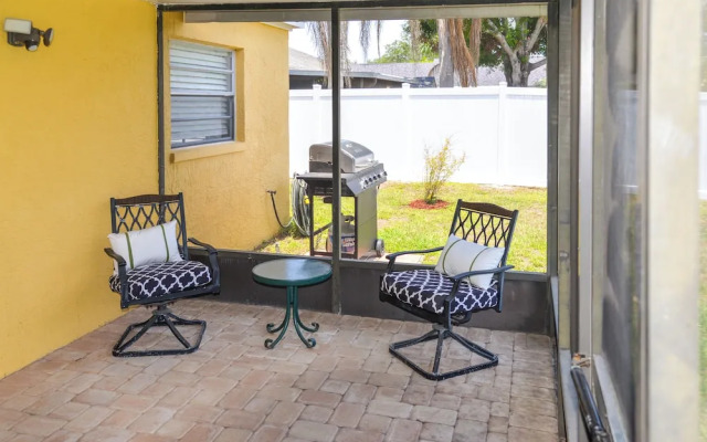 Lanai & Pond at Tranquil Bradenton Retreat!