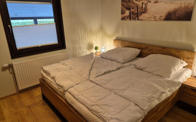 Freistehender Ferienbungalow im Fachwerkstil