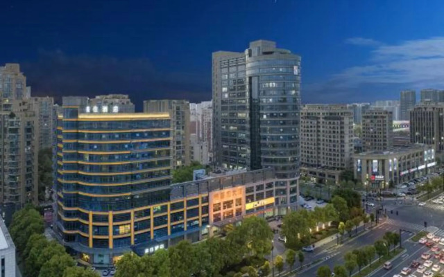 Taizhou Meizhu Hotel (Jiaojiang City Government Avenue Baolongcheng Store)