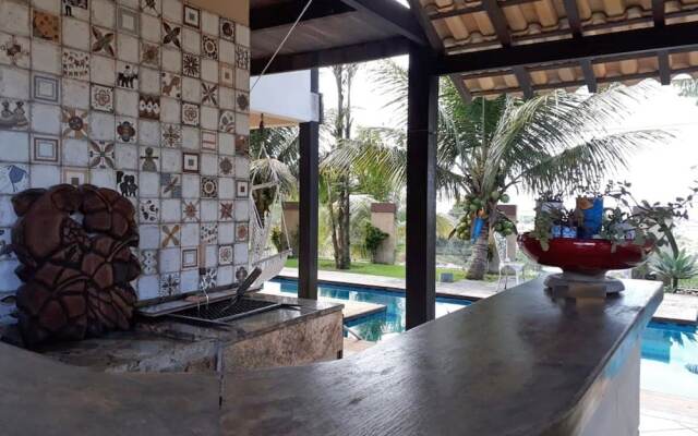 Casa na Praia de Taperapuan com piscina vista Mar