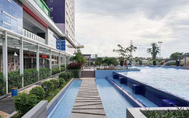 Furnished Studio with Comfortable Design Green Pramuka Apartment