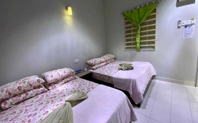 OYO 91002 D Qamar Motel