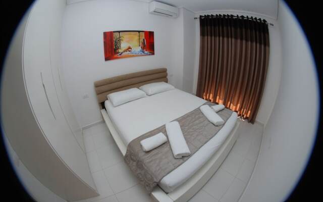 White Deluxe Apartments