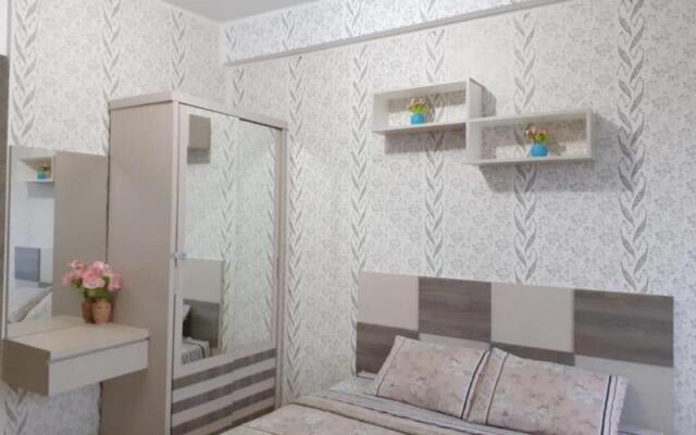 Rose Rooms @ Apartemen Margonda Residence by ZUZU