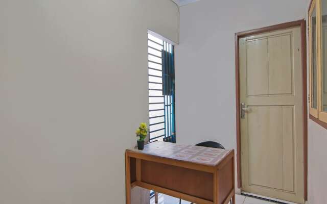 SPOT ON 91958 Flamboyan 25 Homestay Syariah