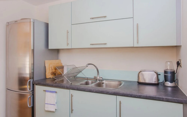 Warm 1 Bedroom Apartment with Balcony