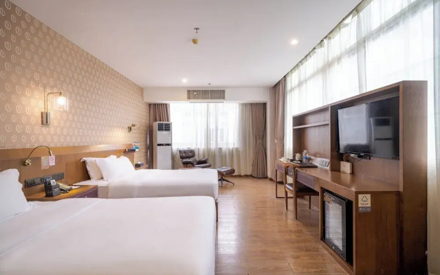 Xingyi Chain Hotel Jiangxia Metro Station