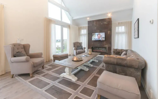 Stylish Holiday Home with Fireplace near Oosterschelde