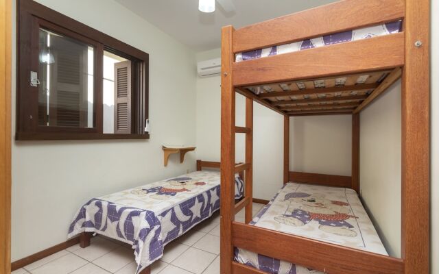 Aluguel Casa 4 quartos 1 suite frente mar 016