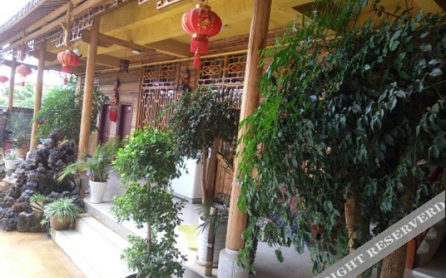 Puzhehei Chengshi Nongyuan Hotel