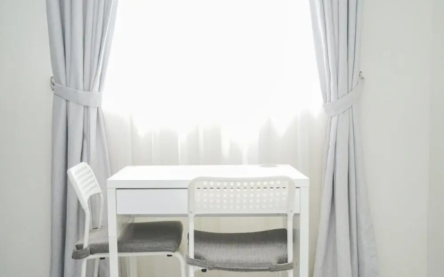 Compact and Monochrome Studio Room Bintaro Icon Apartment