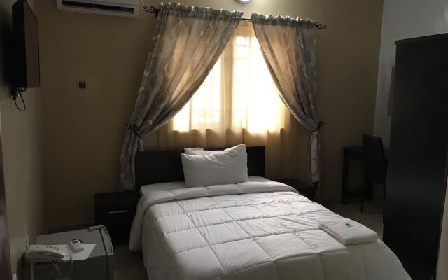 Unifirst hotel & suites