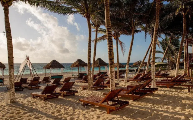 Capital O Hotel Arena Beach Club