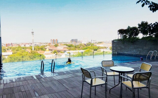 Homey And Serene Studio Apartment At Tamansari Papilio