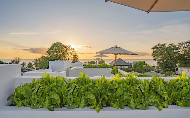 Palm Grove Villas & Hotel
