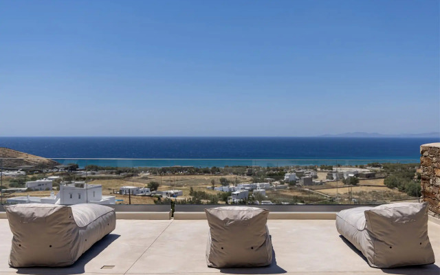 Monogram Travel Tinos