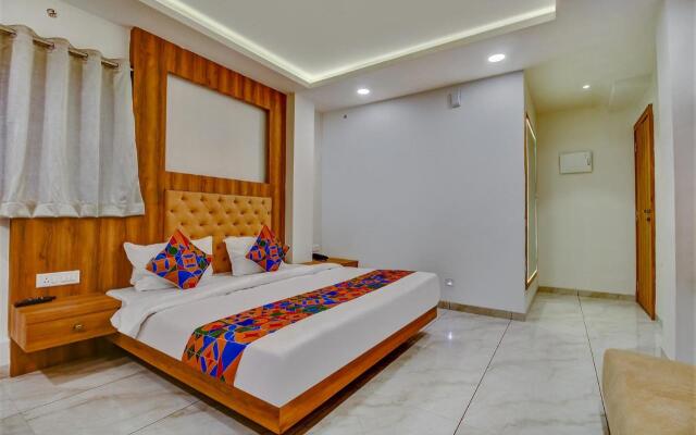 Fabhotel Prime Purple Orchid