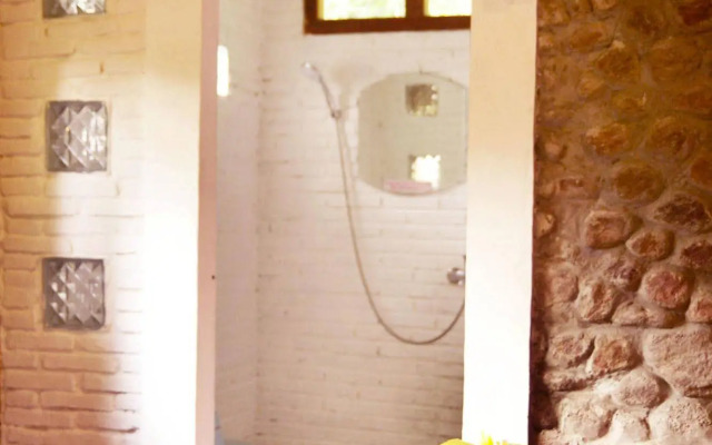 The Riverside Javanese Cottages