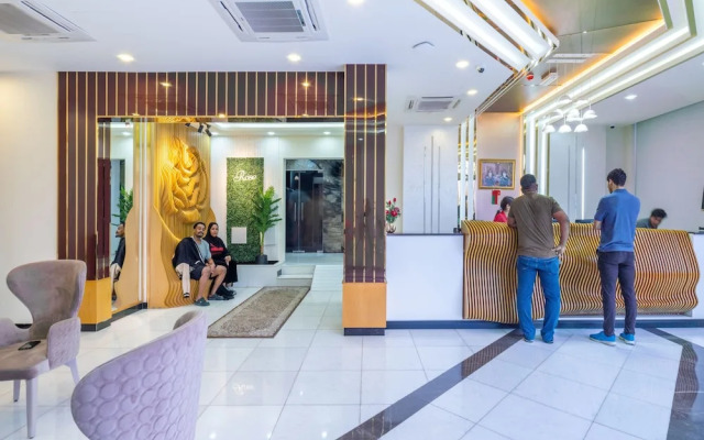 OYO Townhouse 156 Rose Hotel Apartments.