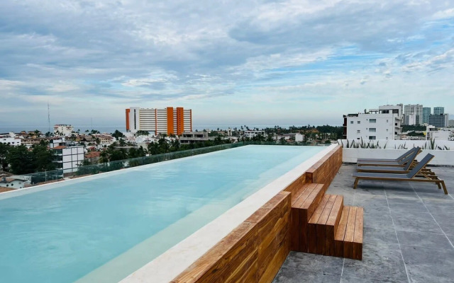 Serene Stylish Stay Roof Pool and Lounge