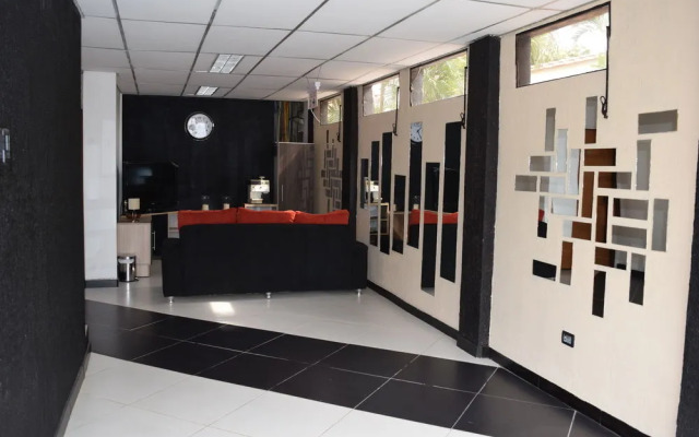 Acosta Ñu Apart Hotel