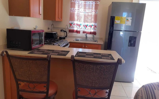 Charming 2-bed House in Portmore Gated Community