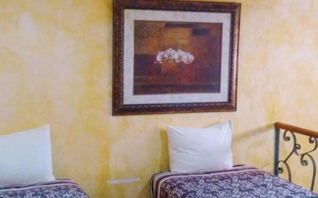 San Miguel & Suites