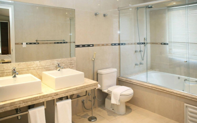 Le Village Flats e Hotel