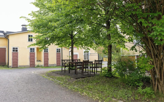 A bright wooden studio for four