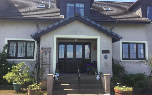 Woodcock Faulds House