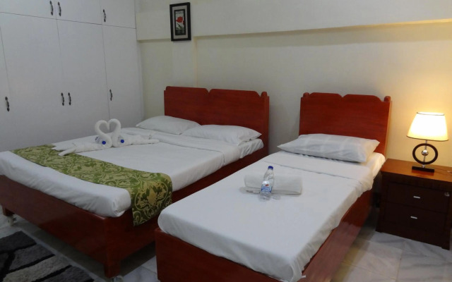 The Executive Villa Inn & Suites