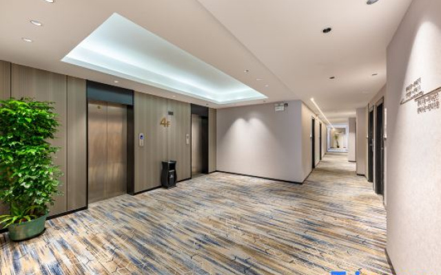 Guangmingren Wellness Hotel (Xiamen Gaoqi Airport SM Plaza)