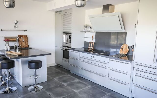 Magnificent waterfront design villa, located near Harderbos