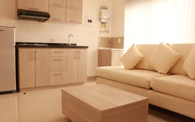 Apartasuites La Flora