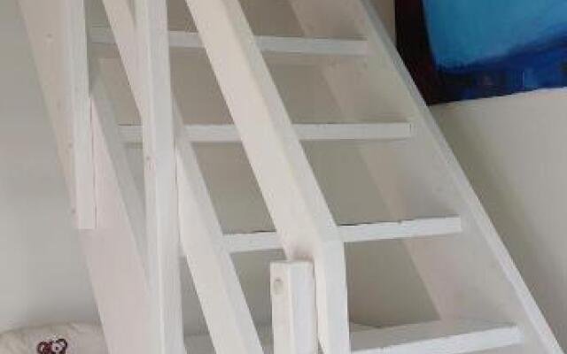 Apartment Ruhetgaard Bed & kitchen