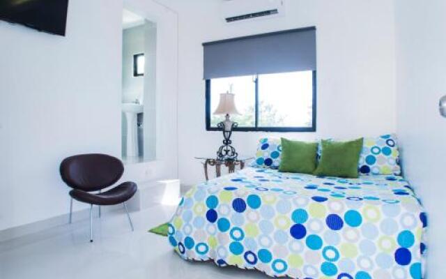 Malecon Rooms y Hotel
