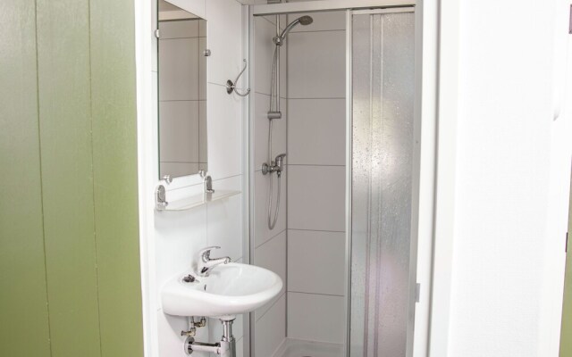 Nice house with a garden, surrounded by forest