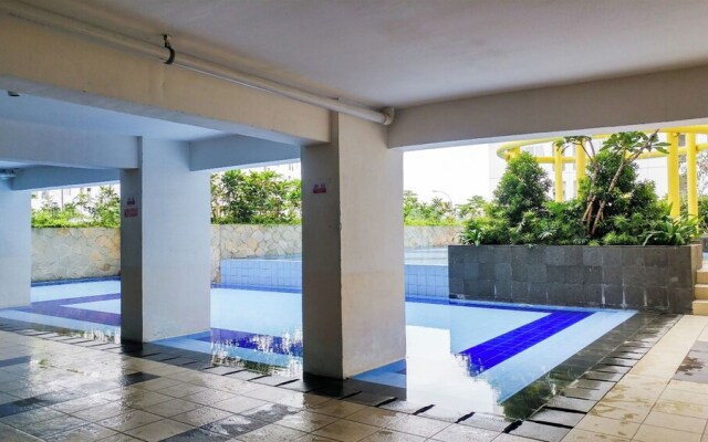 Restful 2Br Bassura City Apartment Near Shopping Mall