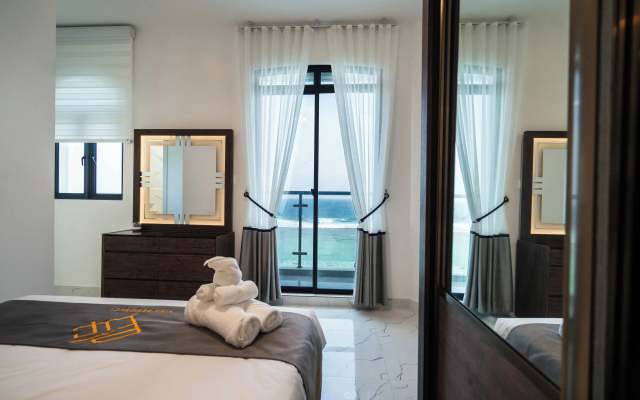 Aina Residency Beachfront Hotel