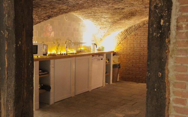 Top apartment along canal in historic centre