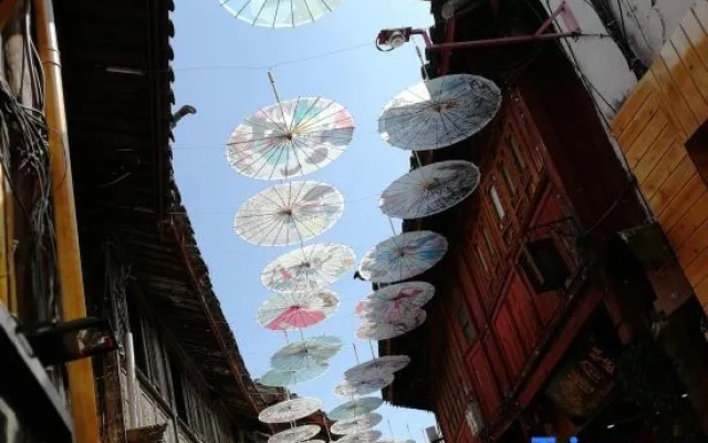 Yiyuan Snow Mountain View Courtyard Inn (Lijiang ancient city mufu branch)