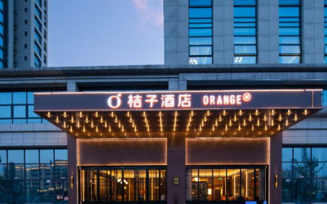 Orange Hotel (Yibin West Railway Station WanXiang World)