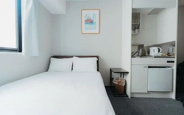 Отель Unito Shiodome