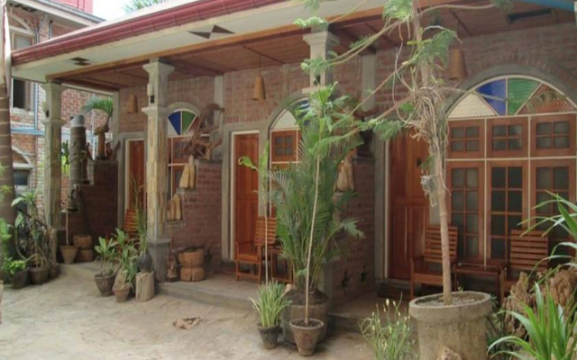 Teak Wood Hotel