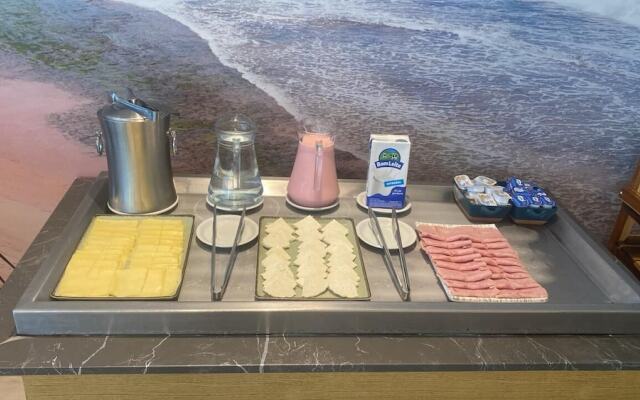Flats Mana Beach Experience - Muro alto